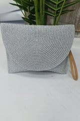 Concentric Circle Straw Clutch Bag
