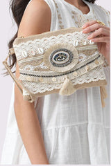 Eye Detail Shell Tassel Bag